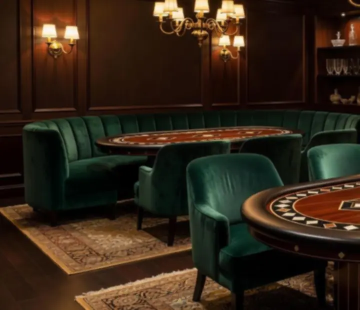 Detailed view of poker tables, brass fixtures, and table settings in the venue